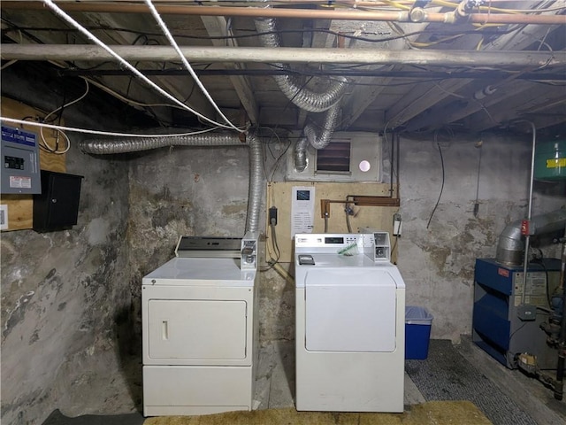 60 Sherman St, Pawtucket, RI 02860 - unfinished basement featuring washer and clothes dryer, a heating unit, and electric panel