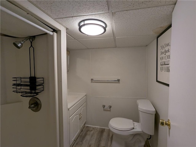 60 Sherman St, Pawtucket, RI 02860 - bathroom with a paneled ceiling, vanity, and wood finished floors