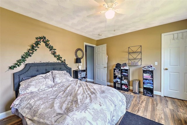 827 Anthony Rd, Portsmouth, RI 02871 - bedroom with wood finished floors and a ceiling fan