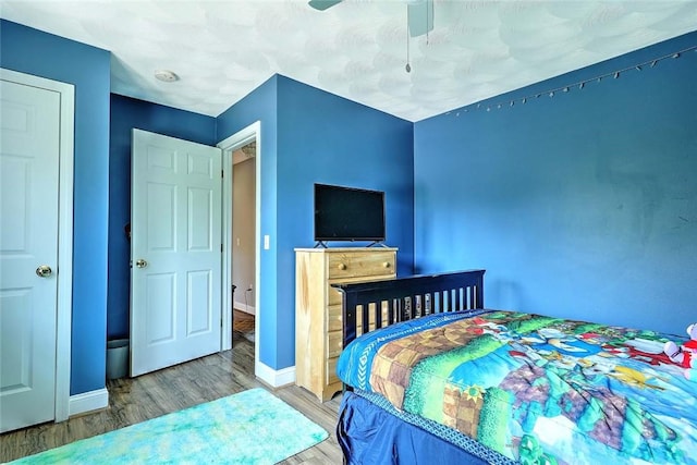 827 Anthony Rd, Portsmouth, RI 02871 - bedroom with wood finished floors and a ceiling fan