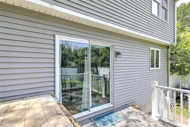 827 Anthony Rd, Portsmouth, RI 02871 - view of exterior entry with a wooden deck