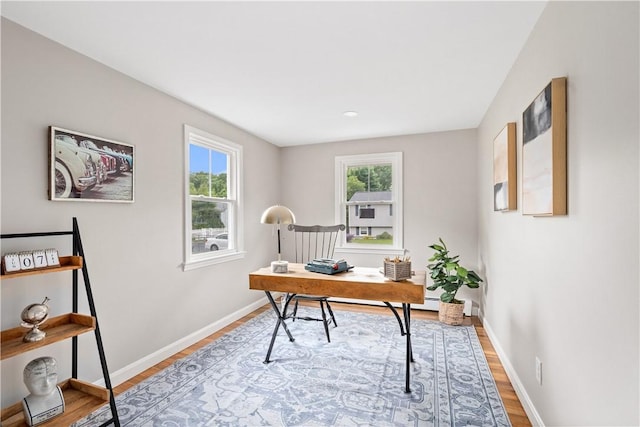 60 Webb Ave, Warwick, RI 02889 - home office featuring light wood-type flooring and baseboards