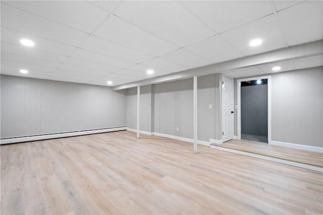 60 Webb Ave, Warwick, RI 02889 - finished basement featuring wood finished floors, baseboard heating, recessed lighting, and a paneled ceiling