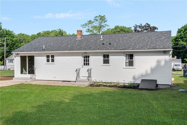 60 Webb Ave, Warwick, RI 02889 - rear view of property featuring entry steps and a lawn