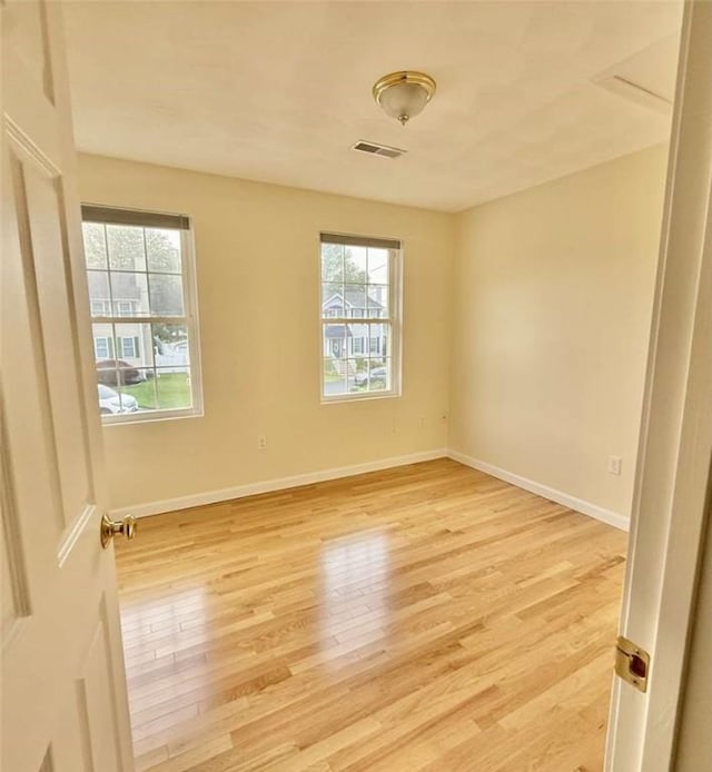 30 Hoover St, West Warwick, RI 02893 - spare room featuring light wood-style flooring and baseboards
