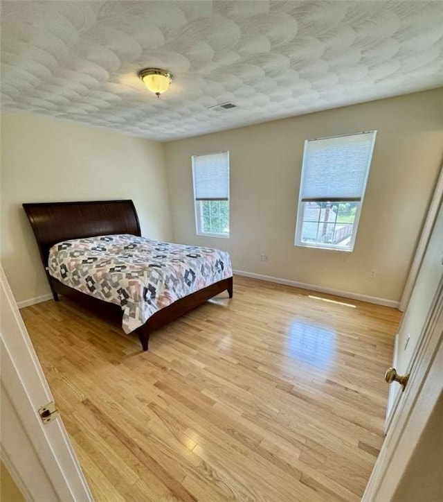 30 Hoover St, West Warwick, RI 02893 - bedroom with light wood finished floors