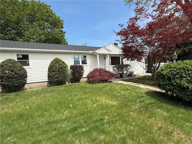 199 First Ave, East Greenwich, RI 02818 - view of front of house featuring a front lawn