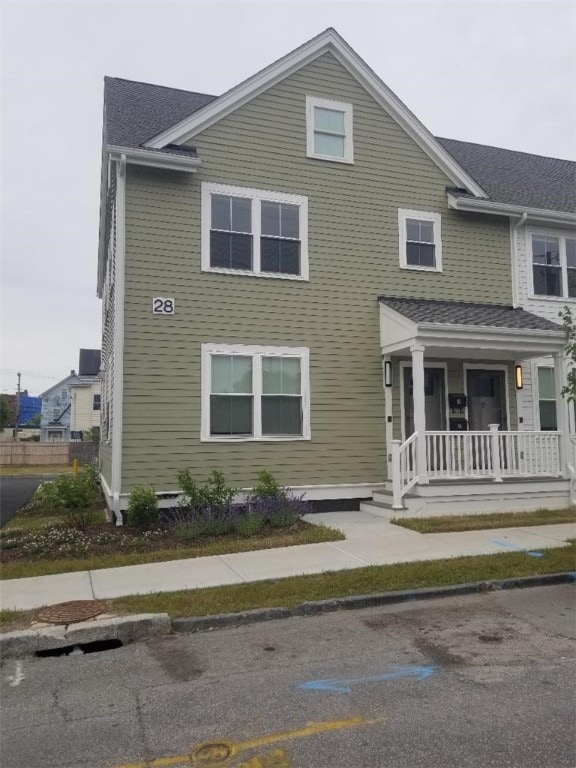 28 Portland St, Providence, RI 02907 - view of front of property featuring a porch