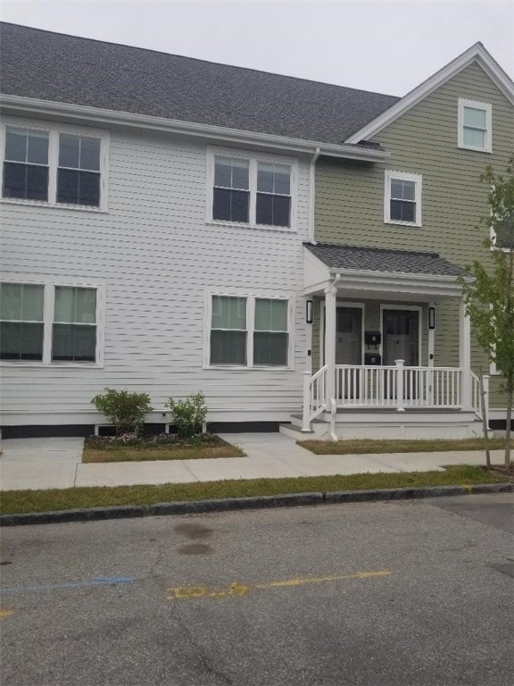 28 Portland St, Providence, RI 02907 - view of front of property featuring covered porch and roof with shingles