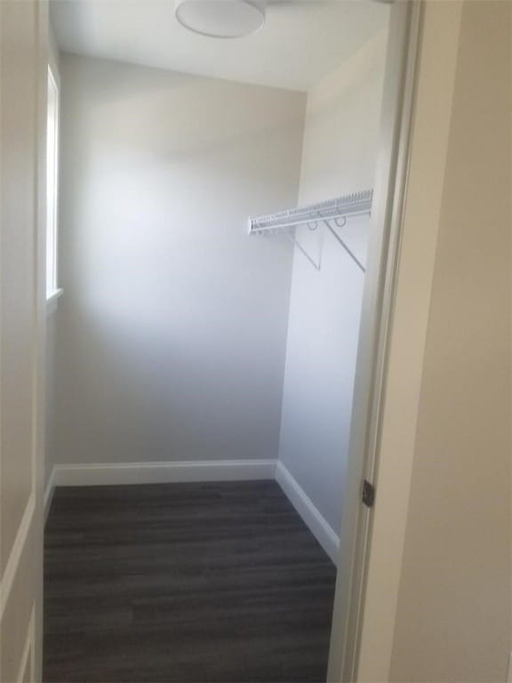 28 Portland St, Providence, RI 02907 - spacious closet featuring dark wood-style flooring