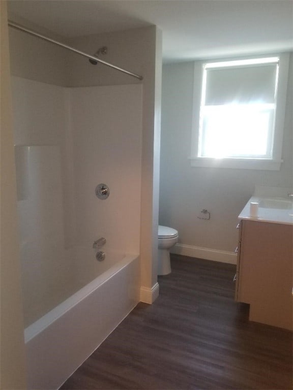 28 Portland St, Providence, RI 02907 - full bathroom with vanity, wood finished floors, and shower / bathtub combination