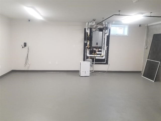 28 Portland St, Providence, RI 02907 - below grade area with baseboards and water heater