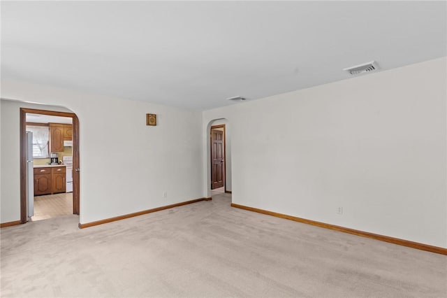 122 Cannon St, Cranston, RI 02920 - unfurnished room featuring arched walkways and light colored carpet