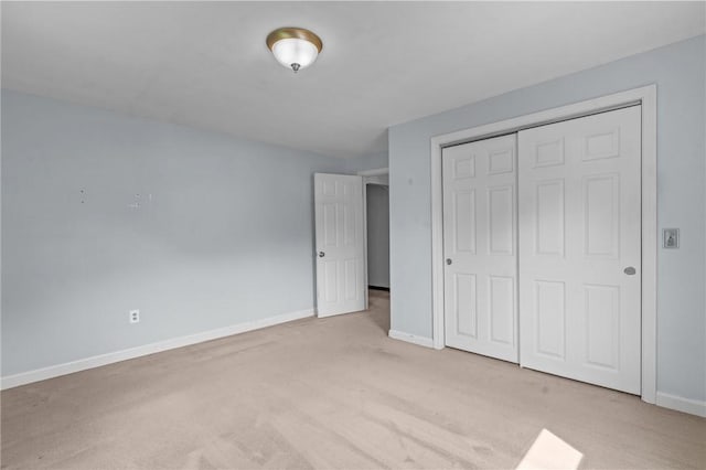 122 Cannon St, Cranston, RI 02920 - unfurnished bedroom featuring light carpet and a closet