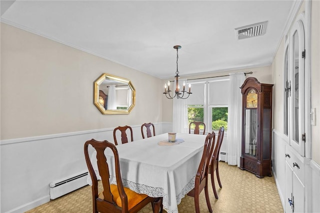 122 Cannon St, Cranston, RI 02920 - dining area with a chandelier, a baseboard radiator, light floors, and ornamental molding