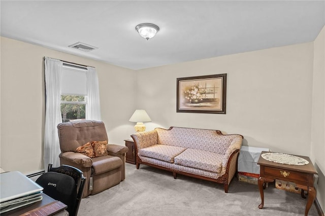 122 Cannon St, Cranston, RI 02920 - living area with light colored carpet and baseboard heating