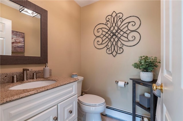 31 Wickaboxet Dr, West Greenwich, RI 02817 - bathroom with baseboard heating, vanity, and tile patterned floors