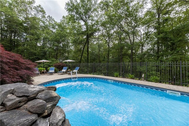 31 Wickaboxet Dr, West Greenwich, RI 02817 - view of swimming pool featuring a patio area