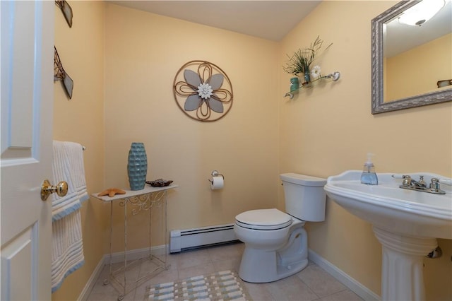 31 Wickaboxet Dr, West Greenwich, RI 02817 - bathroom featuring a baseboard radiator and tile patterned flooring