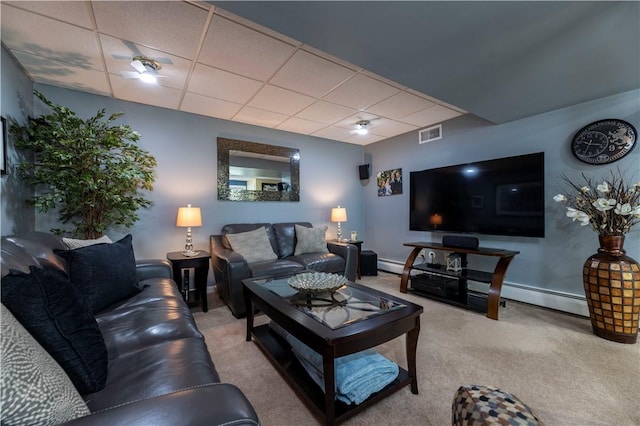 31 Wickaboxet Dr, West Greenwich, RI 02817 - carpeted living area with a paneled ceiling and baseboard heating