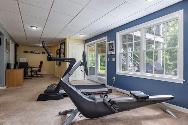 31 Wickaboxet Dr, West Greenwich, RI 02817 - exercise room with carpet, plenty of natural light, and a baseboard heating unit