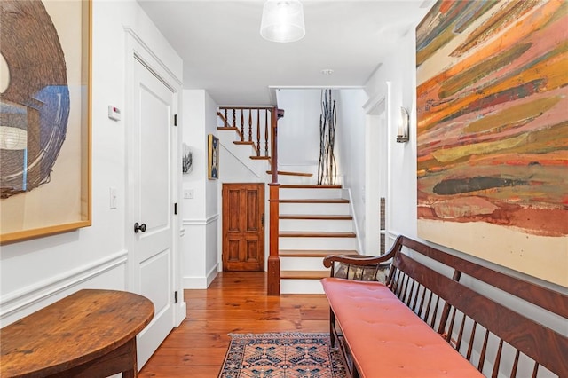 1049 Matunuck Schoolhouse Rd, South Kingstown, RI 02879 - foyer entrance with stairs and wood-type flooring