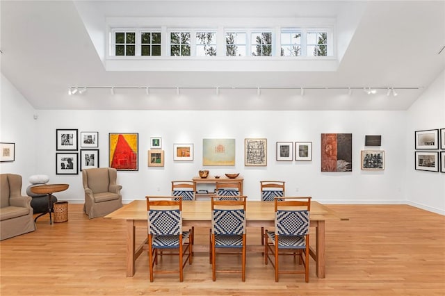 1049 Matunuck Schoolhouse Rd, South Kingstown, RI 02879 - dining room featuring track lighting, light wood-type flooring, and plenty of natural light