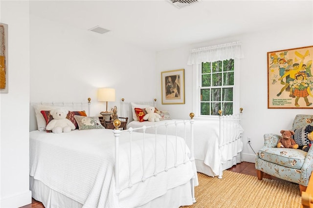 1049 Matunuck Schoolhouse Rd, South Kingstown, RI 02879 - bedroom with wood finished floors and baseboards