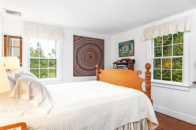 1049 Matunuck Schoolhouse Rd, South Kingstown, RI 02879 - bedroom with wood finished floors and baseboards