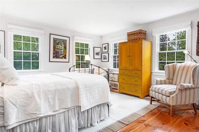1049 Matunuck Schoolhouse Rd, South Kingstown, RI 02879 - bedroom with light wood-style floors