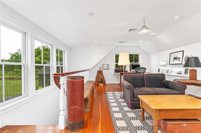 1049 Matunuck Schoolhouse Rd, South Kingstown, RI 02879 - living room featuring vaulted ceiling and wood finished floors