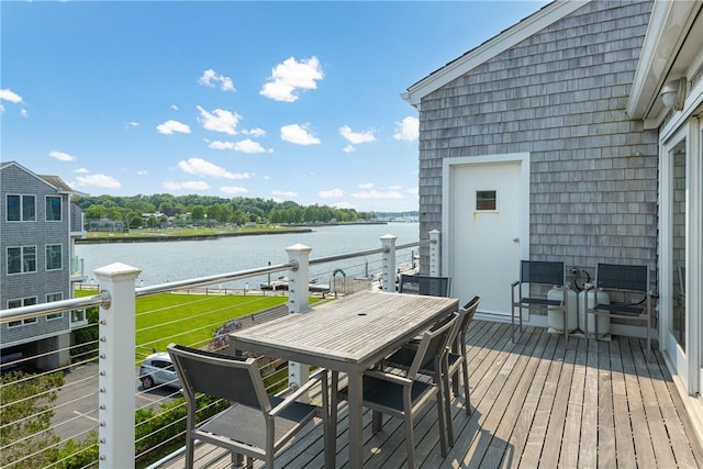 31 Coddington Unit 24, Newport, RI 02840 - deck with a water view and outdoor dining area