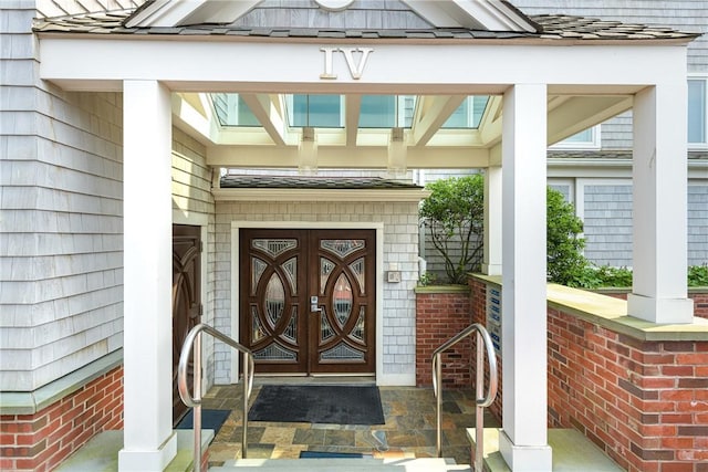 31 Coddington Unit 24, Newport, RI 02840 - entrance to property featuring covered porch and a standing seam roof