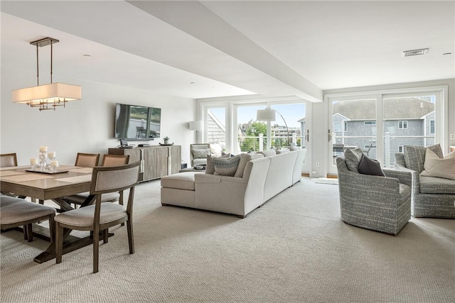 31 Coddington Unit 24, Newport, RI 02840 - living room featuring light colored carpet and healthy amount of natural light