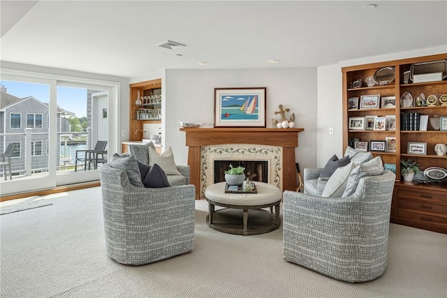 31 Coddington Unit 24, Newport, RI 02840 - living room with a high end fireplace and carpet