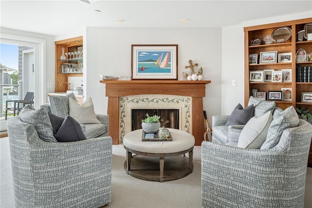 31 Coddington Unit 24, Newport, RI 02840 - carpeted living room featuring a fireplace