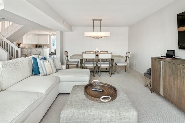 31 Coddington Unit 24, Newport, RI 02840 - living room with light carpet and stairs