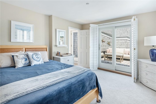 31 Coddington Unit 24, Newport, RI 02840 - carpeted bedroom with access to exterior and multiple windows