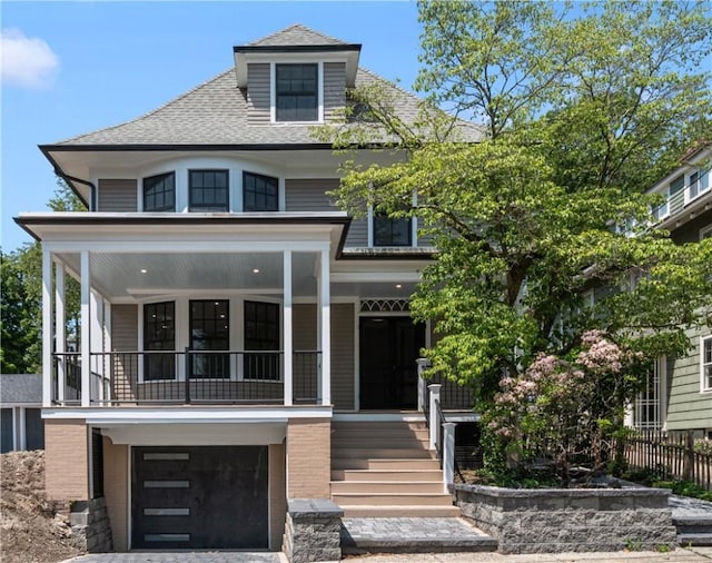 72 Taber St, Providence, RI 02906 - traditional style home featuring a porch, a garage, and roof with shingles