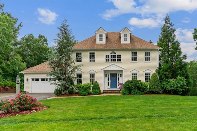 6 Jasons Grant Dr, Cumberland, RI 02864 - colonial inspired home featuring an attached garage, concrete driveway, a front yard, and a shingled roof