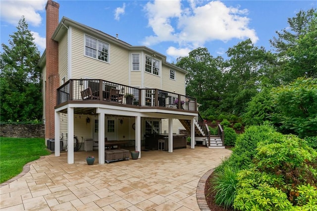 6 Jasons Grant Dr, Cumberland, RI 02864 - rear view of house featuring a chimney, stairs, a patio, and a wooden deck