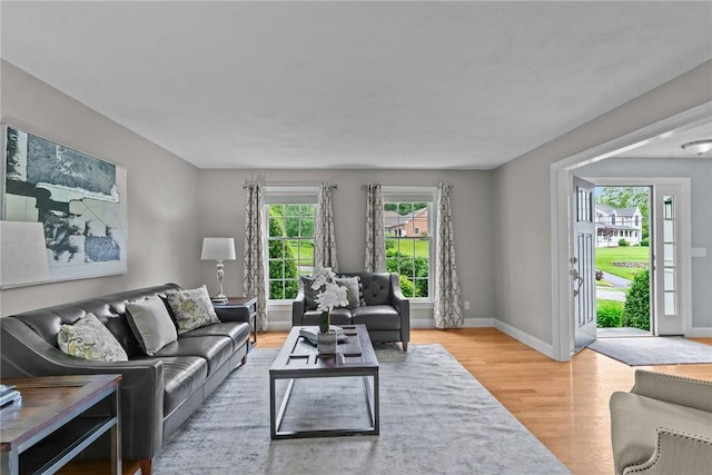 6 Jasons Grant Dr, Cumberland, RI 02864 - living room featuring light wood finished floors and baseboards