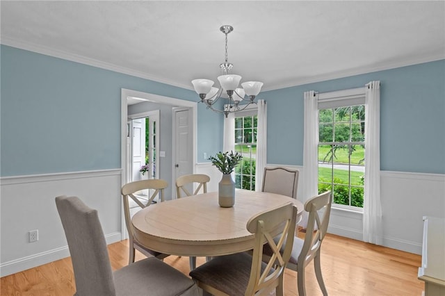 6 Jasons Grant Dr, Cumberland, RI 02864 - dining room with a wainscoted wall, a chandelier, ornamental molding, and light wood-style flooring