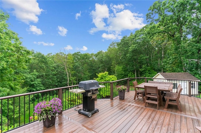 6 Jasons Grant Dr, Cumberland, RI 02864 - wooden deck with grilling area, outdoor dining space, and a forest view
