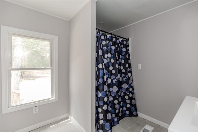 56 Park Ln, Coventry, RI 02816 - bathroom featuring baseboards and a shower with shower curtain