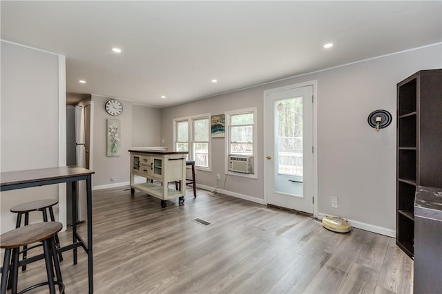 56 Park Ln, Coventry, RI 02816 - dining room featuring wood finished floors, recessed lighting, and cooling unit