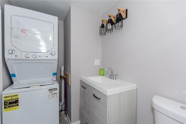 56 Park Ln, Coventry, RI 02816 - laundry area with stacked washer / drying machine