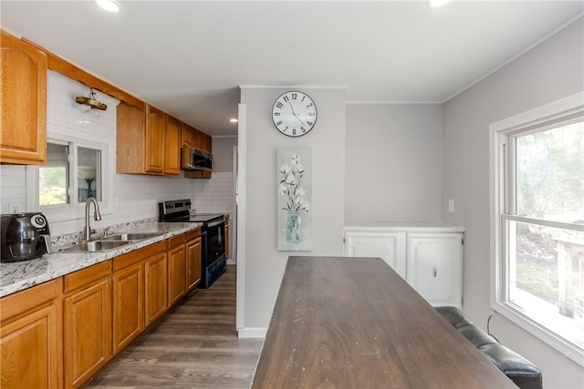 56 Park Ln, Coventry, RI 02816 - kitchen with black / electric stove, dark wood-type flooring, healthy amount of natural light, and recessed lighting