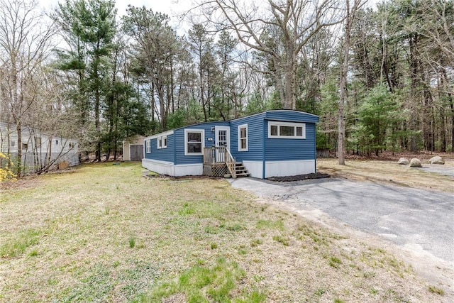 56 Park Ln, Coventry, RI 02816 - manufactured / mobile home with a front yard