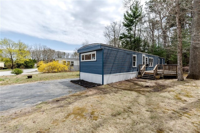 56 Park Ln, Coventry, RI 02816 - view of front of home featuring a deck